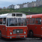Whitehaven bus depot, parking area. There is a story that Cumberland's intention was that the three dual purpose RELLs should in fact have been RELHs similar to number 600. Quite how such a mistake failed to be noticed until the three buses were completed rather taxes the imagination! Additionally, the October 1970 issue of 'Buses' lists the Cumberland order for 1971 as 14 RELLs, which would be 289-302 - i.e. exactly that which was delivered. As 296-8 were delivered in Spring 1972, it would seem to have been known in at least some quarters that they were to be RELLs! Bristol RE 298 DAO298K at Whitehaven