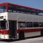 In 1984 Southampton City Transport purchased 4 buses for evaluation as potential fleet standard vehicles, now that the Leyland Atlantean was no longer available. 277 was a Dennis Dominator with Maxwell gearbox, and the East Lancs body carried the standard fleet livery, but had some modern features by comparison with the traditional appearance of the large fleet of Atlanteans. The style was attractive, with a pleasantly raked front, but a couple of features spoiled the overall effect. The square corners of the upper deck front window jarred with the rounded corners of the other windows; while the upswept lower edge to the last window on the top deck looks odd - why do bodybuilders make windows at the back shallower, when that is almost always the darkest part of the bus? The Park Royal/Alexander style of driver's windscreen does not blend with the rest of the bodywork in the way that East Lancs' own version, as used on the Atlanteans, did - and the split level entrance - a compromise used on some vehicles prior to the development of true low floor buses - looks untidy. Dennis Dominator A277ROW at Portswood