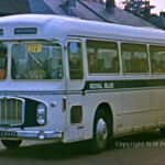 Royal Blue used (briefly) a white livery with a single (royal) blue waistband. The depth of the waistband was variable, to suit the design of the vehicle. The style was standardised for NBC's coaching operations in the south west, with individual operators using their own colours for the relief. White tends to give a rather bland appearance, but this was considerably better than the overall white that was to come shortly after. OTA644G is leaving Southampton Coach Station, bound for Northampton. Bristol RELH OTA644G at Southampton